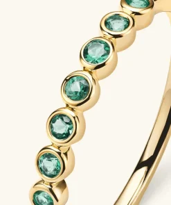 Rings<Mejuri Bezel Emerald Half Eternity Band
